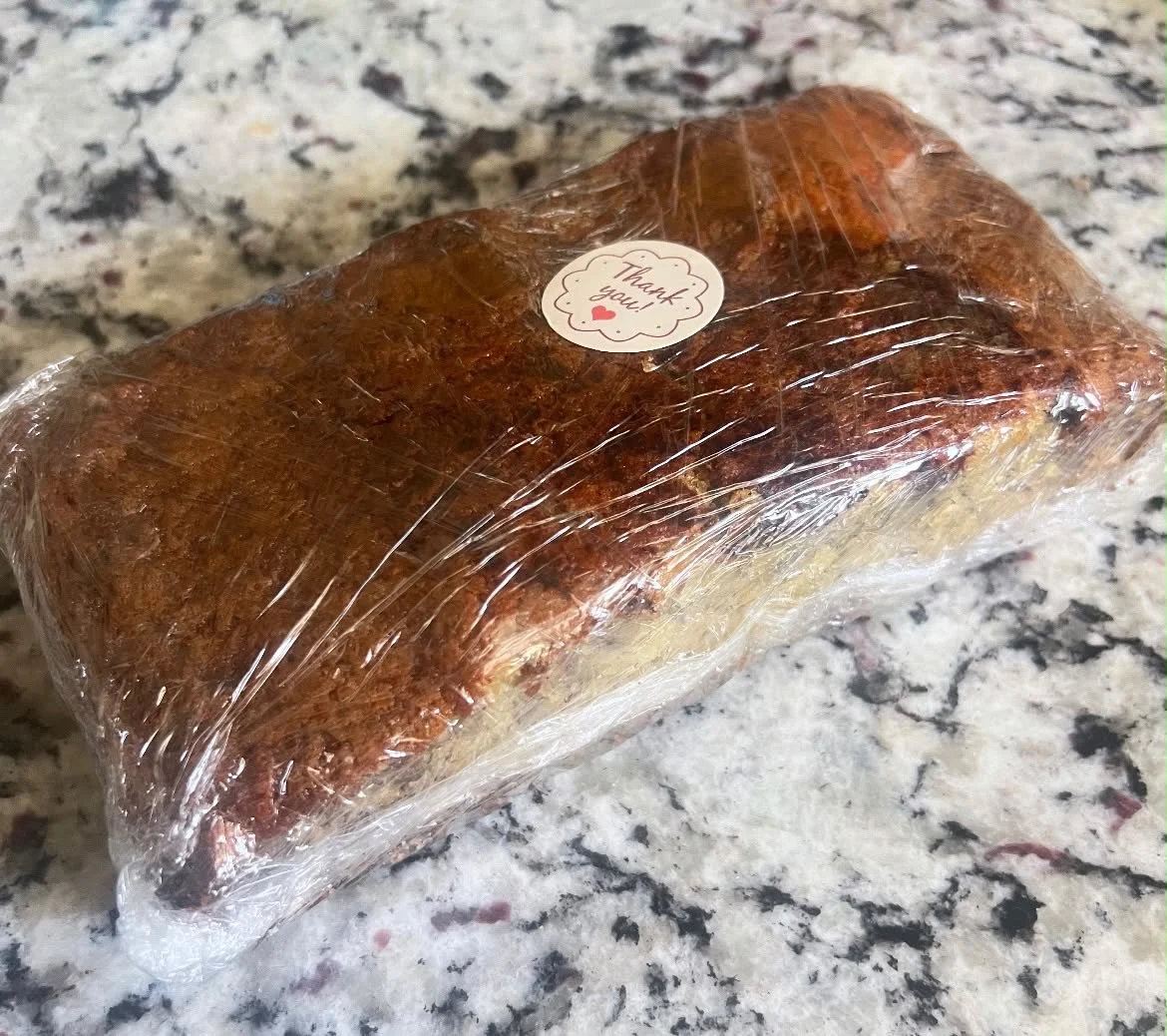 Wrapped homemade sweet bread with a Sofi Bakes label